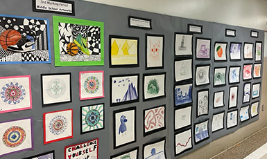  view of art hanging on the school walls